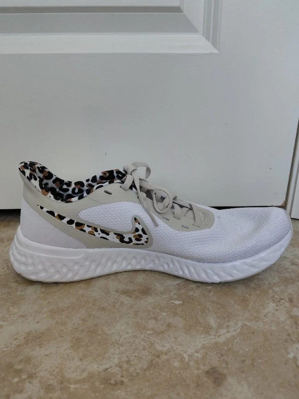 Nike Revolution Cheetah Detailed Running Shoe